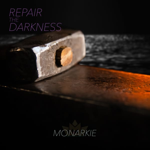 Album cover: Close up of the head of a hammer sitting atop an anvil placed in the foreground of a moonlit body of water. Text: Repair the Darkness. Monarkie (Logo)