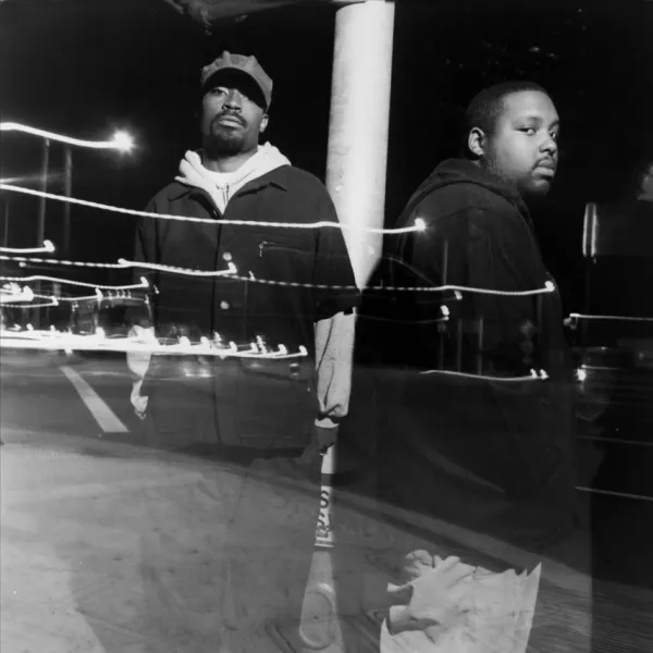 Stylized photo of The Nonce (L to R: Yusef Afloat, Nouka Basetype). The two members are semi-transparent standing on a street corner 