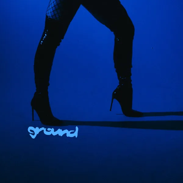 Album cover: Deep blue background with a pair of legs in black leggings and high heel boots Text: Ground